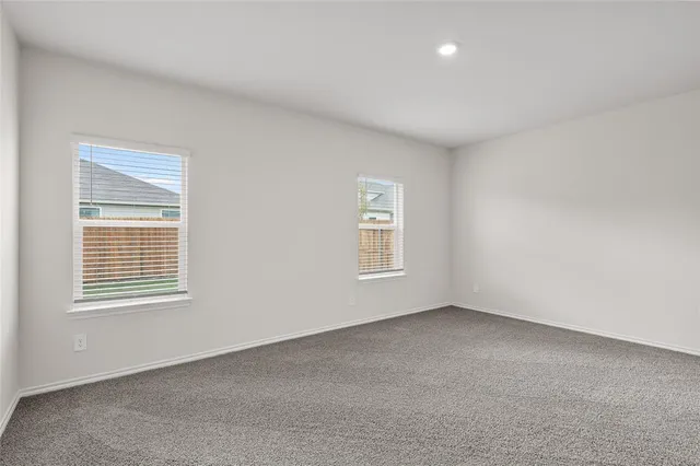 a bathroom with a double vanity sink and mirror