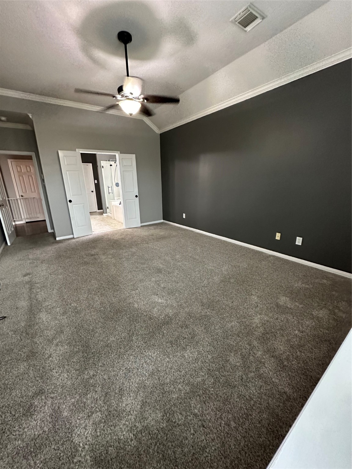 20235 Concord Hill Drive Cypress, TX 77433 - Photo 16 of 27 a view of an empty room with a chandelier fan