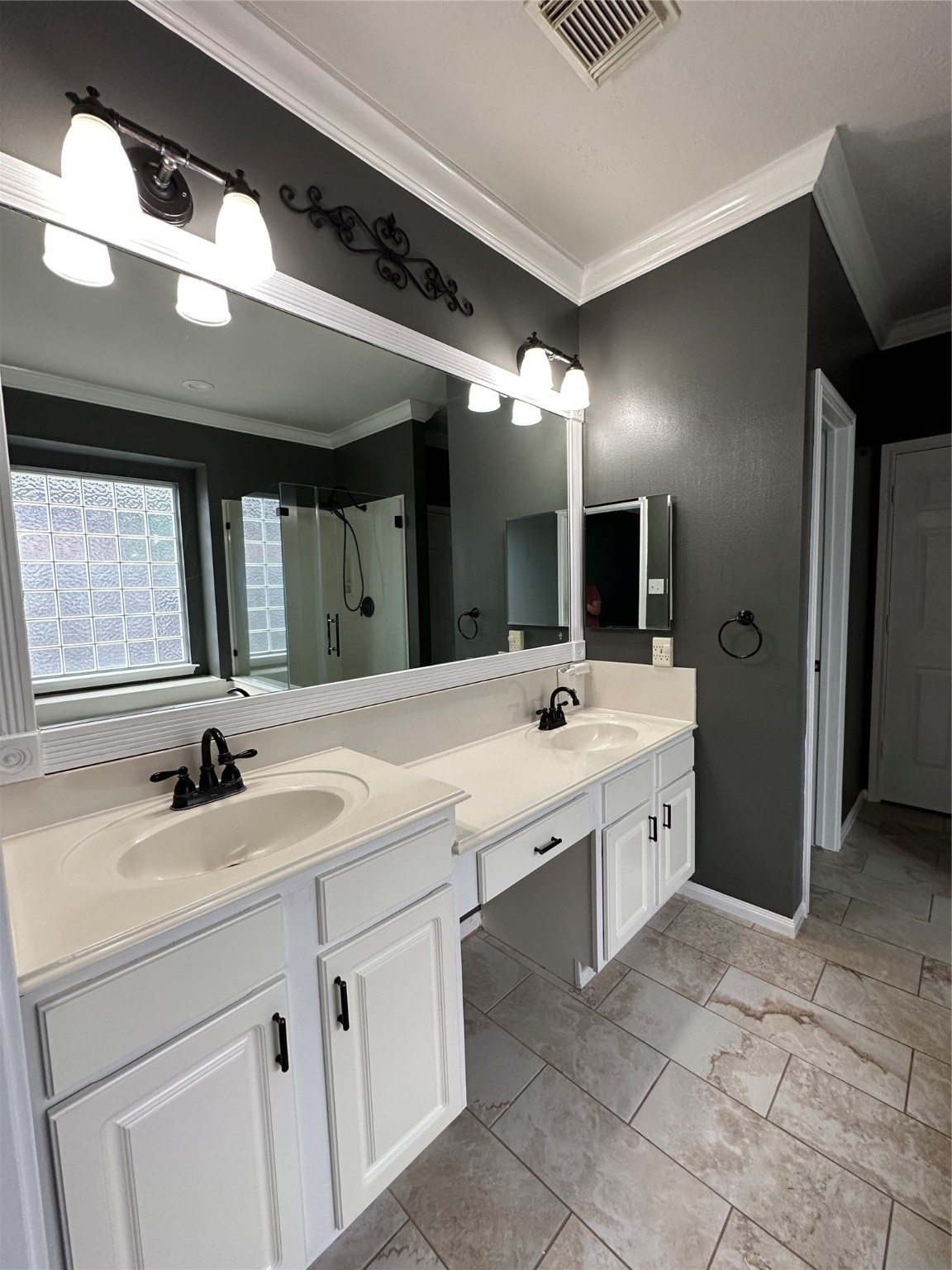 20235 Concord Hill Drive Cypress, TX 77433 - Photo 18 of 27 a bathroom with a double vanity sink and a mirror