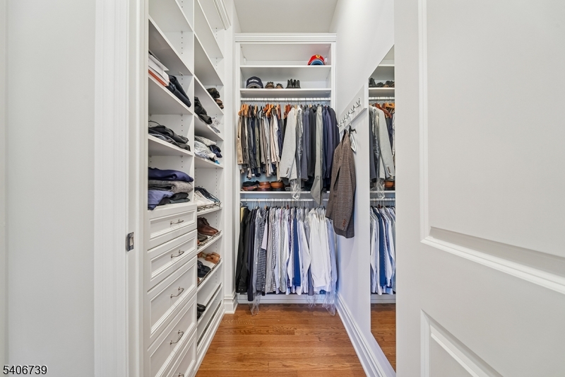 14 Euclid Avenue, Unit 102 Summit, NJ 07901 - Photo 15 of 20 a view of walk in closet with clothes