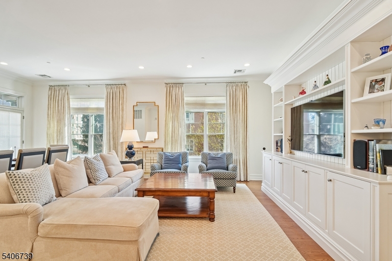 14 Euclid Avenue, Unit 102 Summit, NJ 07901 - Photo 4 of 20 a living room with furniture and large windows