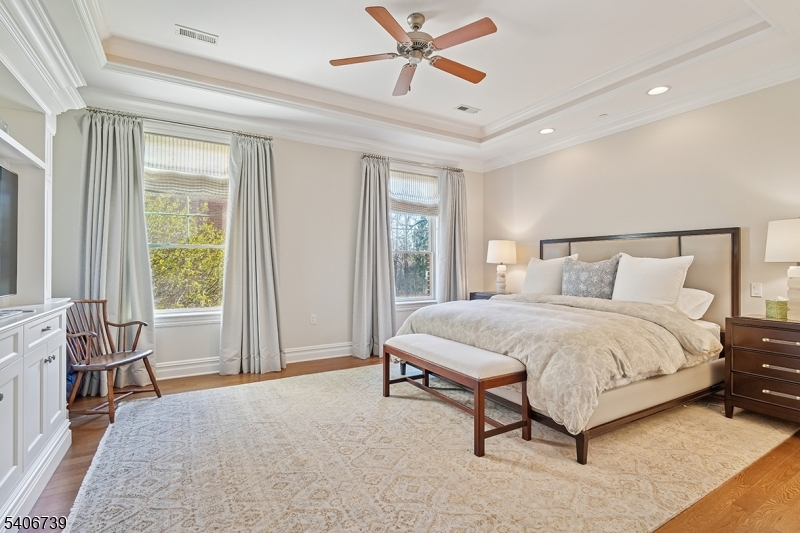 14 Euclid Avenue, Unit 102 Summit, NJ 07901 - Photo 10 of 20 a spacious bedroom with a bed and a window