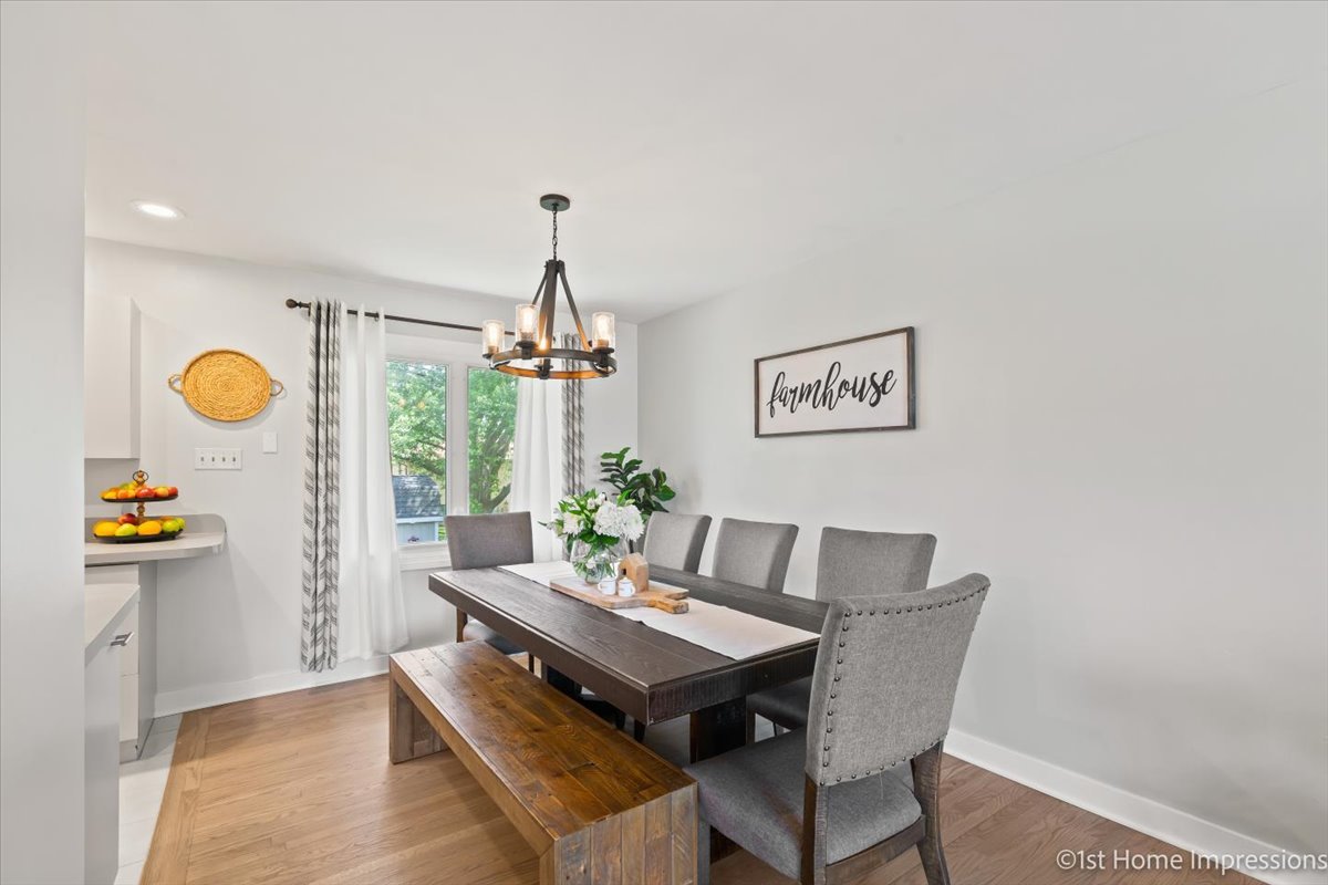 15309 Walnut Road Oak Forest, IL 60452 - Photo 5 of 26 a view of a dining room with furniture and a window