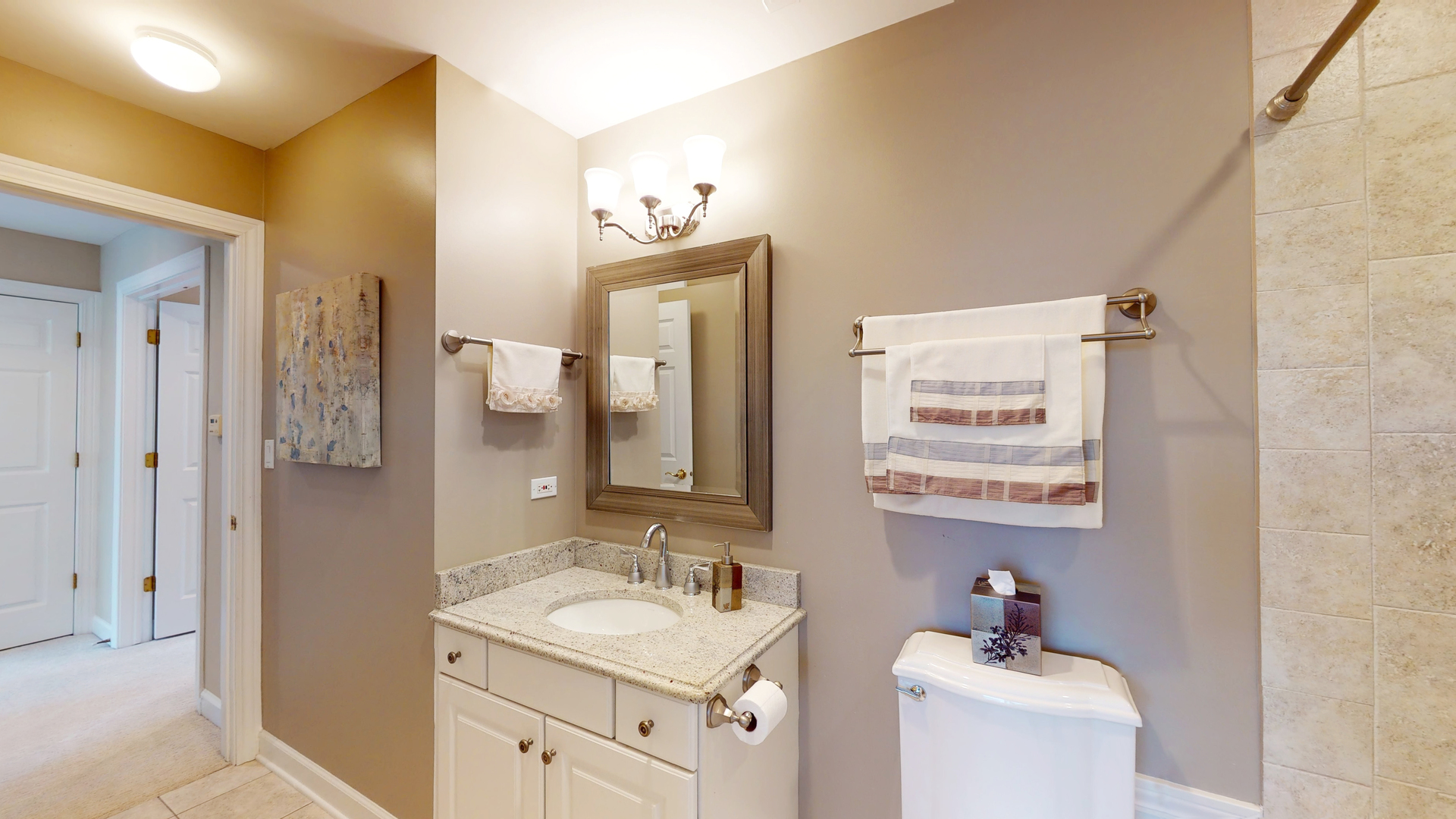 S564 Old York Road Elmhurst, IL 60126 - Photo 27 of 41 a bathroom with a sink and a mirror