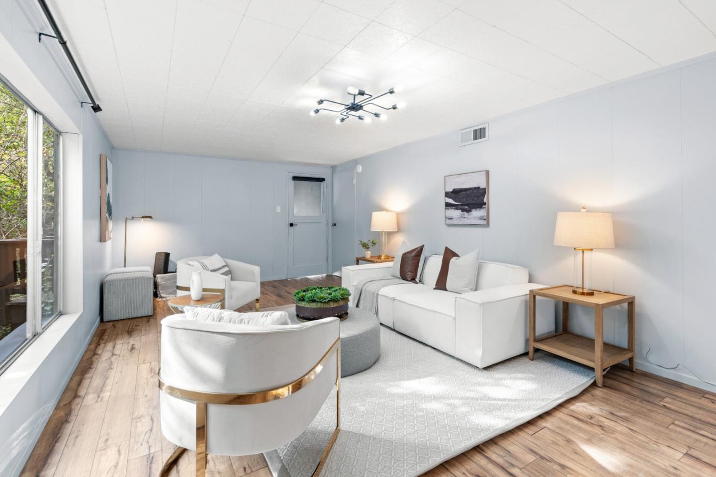 5 La Mancha Place Millbrae, CA 94030 - Photo 55 of 72 a living room with furniture and a chandelier