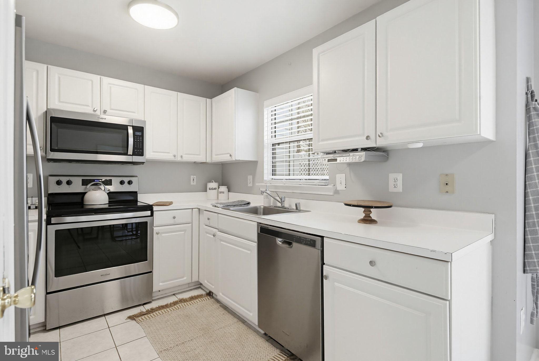2220 Commissary Circle Odenton, MD 21113 - Photo 15 of 30 Bright and modern kitchen with sleek finishes.