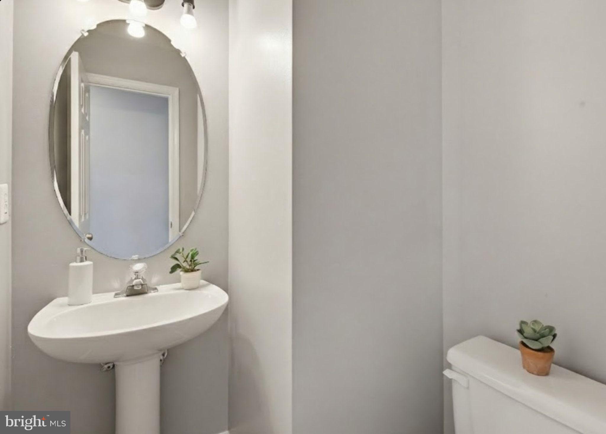 2220 Commissary Circle Odenton, MD 21113 - Photo 16 of 30 Sleek bathroom with modern elegance.