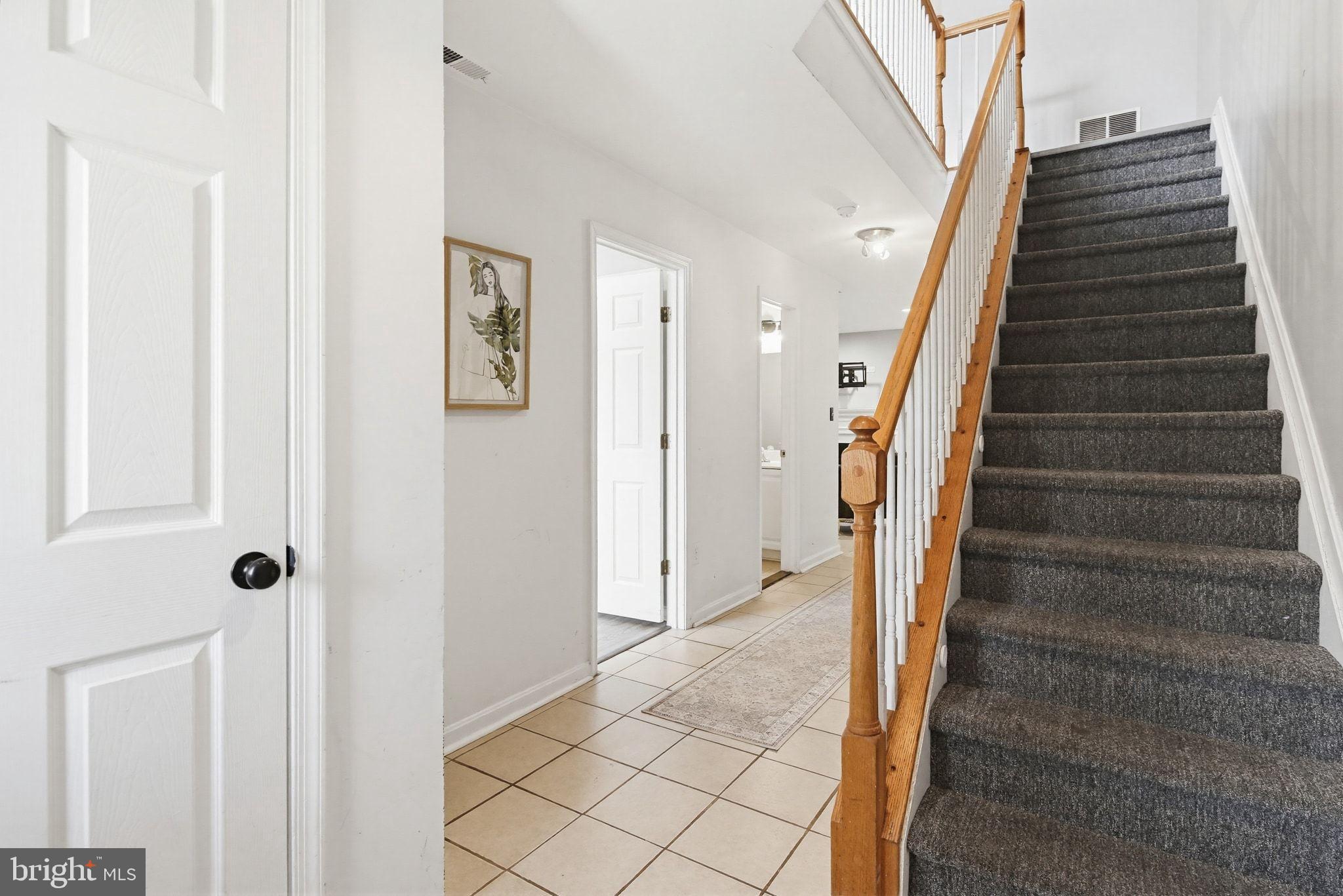 2220 Commissary Circle Odenton, MD 21113 - Photo 2 of 30 Inviting entryway with elegant staircase.