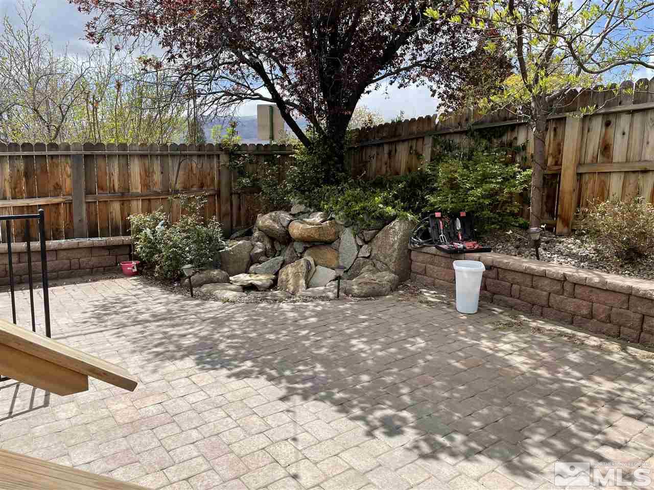 1690 Carlin Street Reno, NV 89503 - Photo 28 of 31 a view of a backyard with sitting area