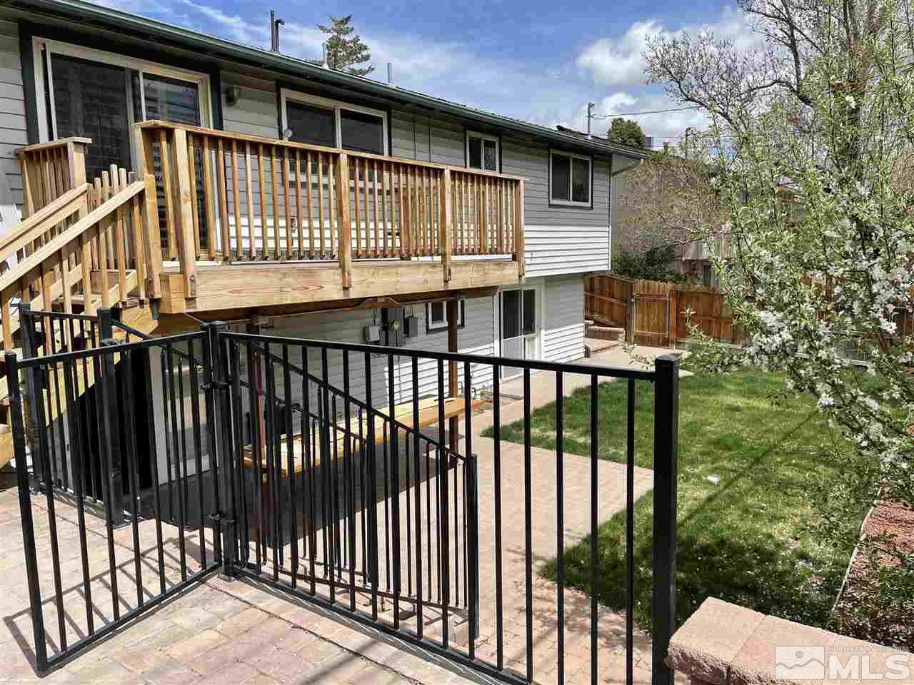 1690 Carlin Street Reno, NV 89503 - Photo 29 of 31 a view of a brick house with a large window