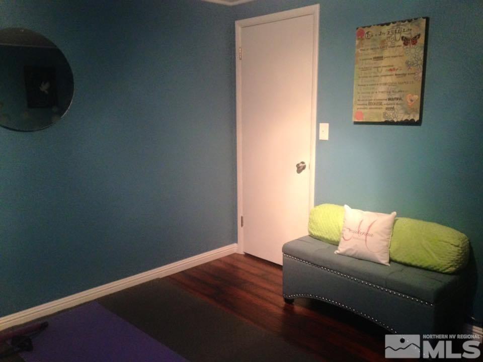 1690 Carlin Street Reno, NV 89503 - Photo 9 of 31 an empty room with a couch