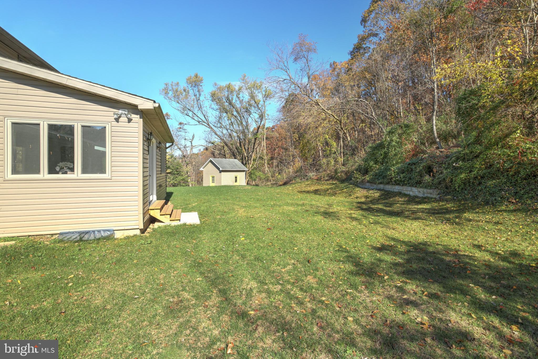 1734 Hametown Road Glen Rock, PA 17327 - Photo 37 of 40 Looking across the backyard to the outbuilding.