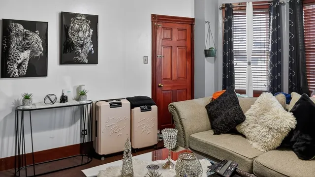 a living room with furniture and window