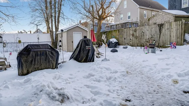 a view of car parked in front of house