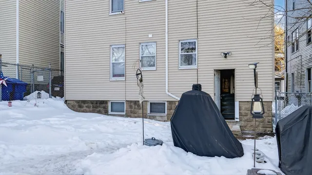 a view of a back yard of the house
