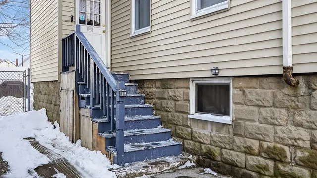 a view of entryway with a front door