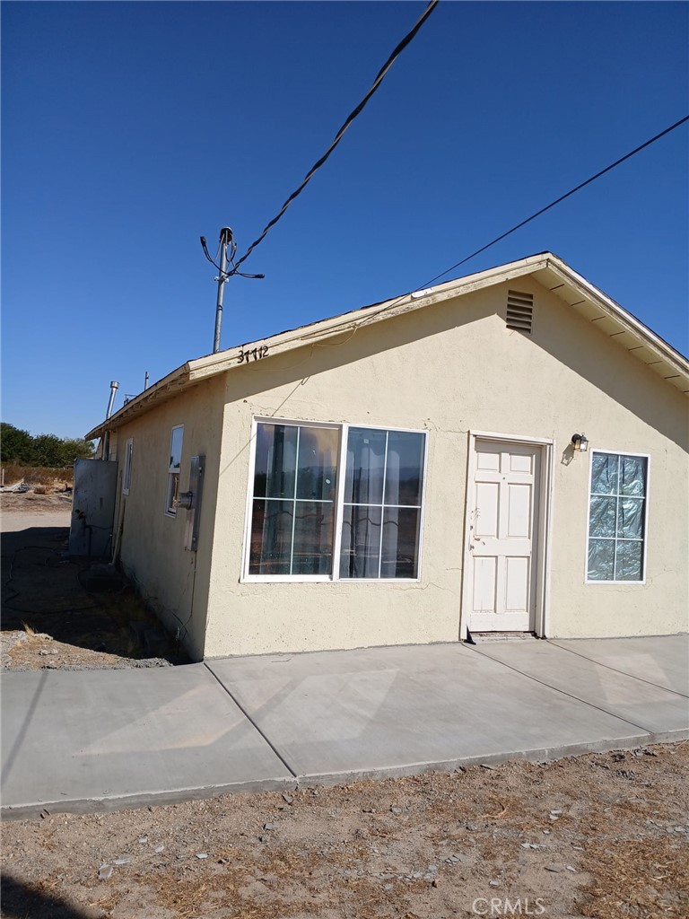 37712 210th Street East Palmdale, CA 93591 - Photo 1 of 12 a front view of a house