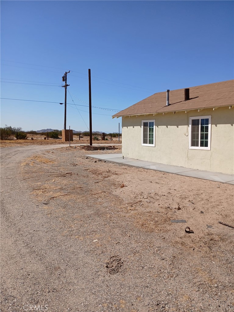 37712 210th Street East Palmdale, CA 93591 - Photo 12 of 12 a view of a house with a backyard