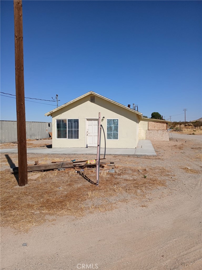 37712 210th Street East Palmdale, CA 93591 - Photo 2 of 12 a view of a house with backyard