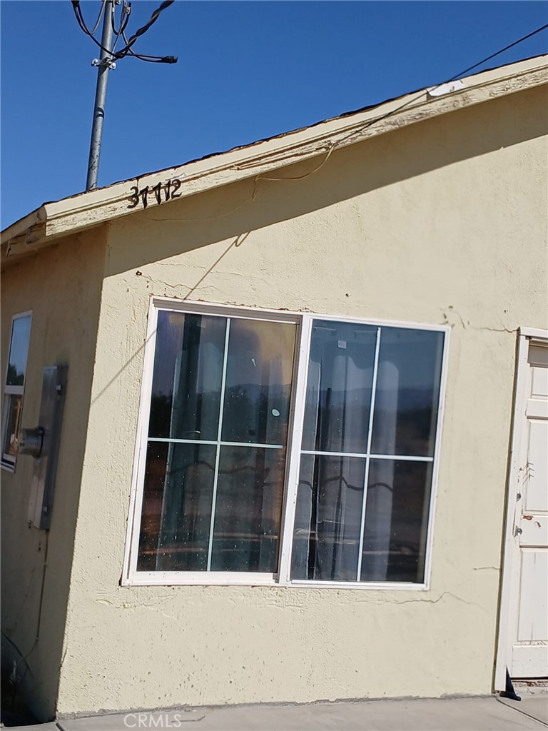 37712 210th Street East Palmdale, CA 93591 - Photo 3 of 12 a view of front door