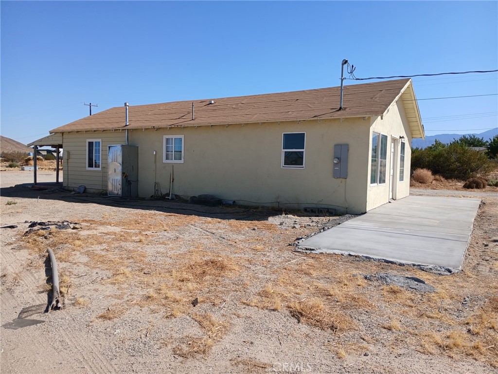 37712 210th Street East Palmdale, CA 93591 - Photo 4 of 12 a front view of a house with a yard