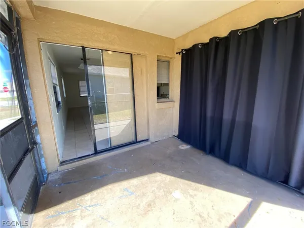 a view of walk in closet with wide window