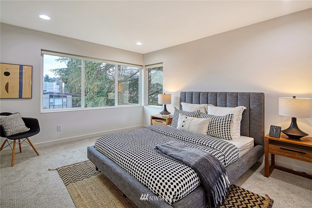 2858 Southwest Adams Street Seattle, WA 98126 - Photo 18 of 24 a bedroom with double bed and a window