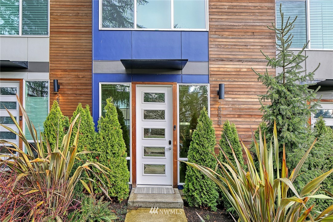 2858 Southwest Adams Street Seattle, WA 98126 - Photo 3 of 24 a view of a backyard with plants