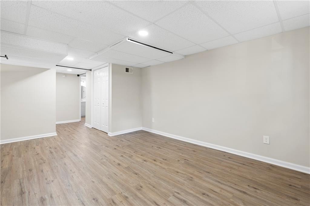 33 Smyrna Powder Springs Road Southeast Marietta, GA 30060 - Photo 28 of 37 a view of an empty room with wooden floor
