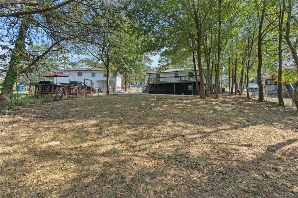 33 Smyrna Powder Springs Road Southeast Marietta, GA 30060 - Photo 33 of 37 a front view of a house with a yard