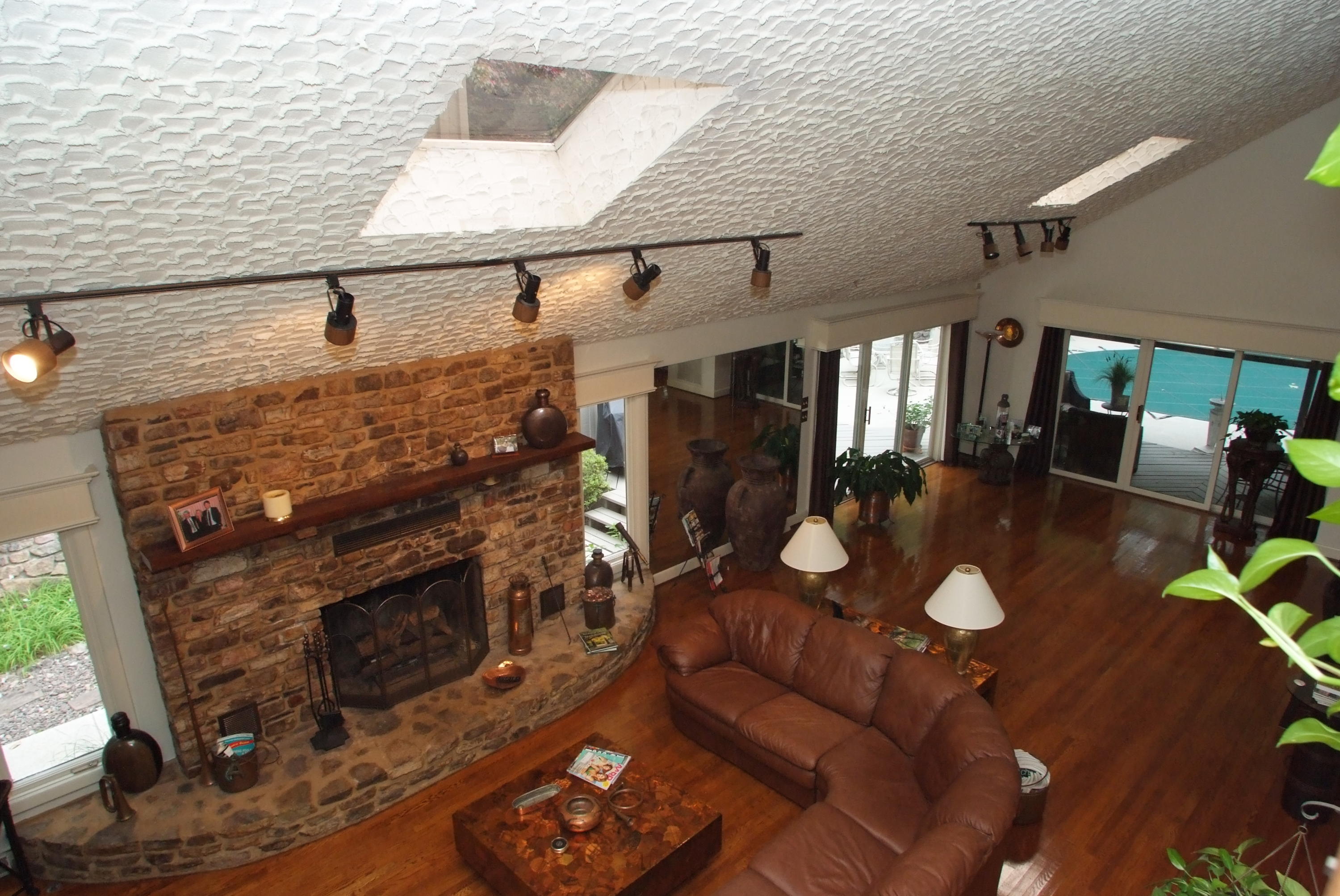 4838 Deerfield Road Southwest Roanoke, VA 24018 - Photo 16 of 26 a living room with furniture and wooden floor