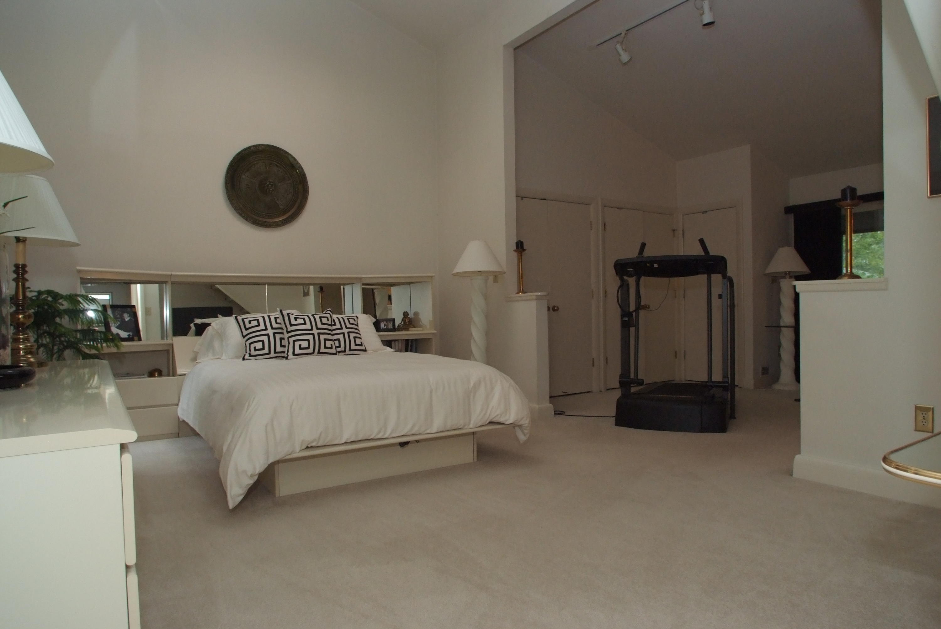 4838 Deerfield Road Southwest Roanoke, VA 24018 - Photo 18 of 26 a bedroom with a bed and walk in closet