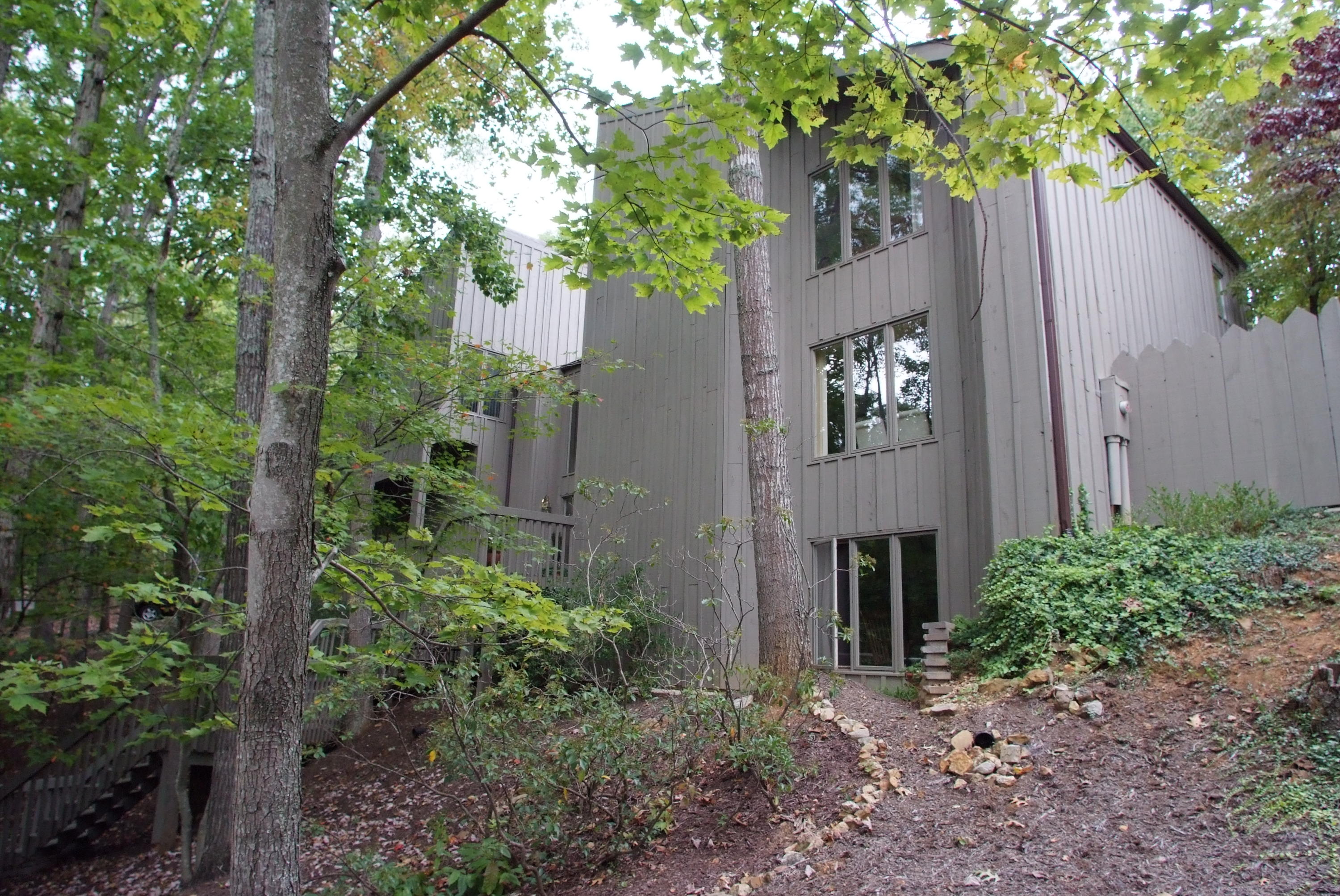 4838 Deerfield Road Southwest Roanoke, VA 24018 - Photo 26 of 26 a view of a front of house with a large tree and plants