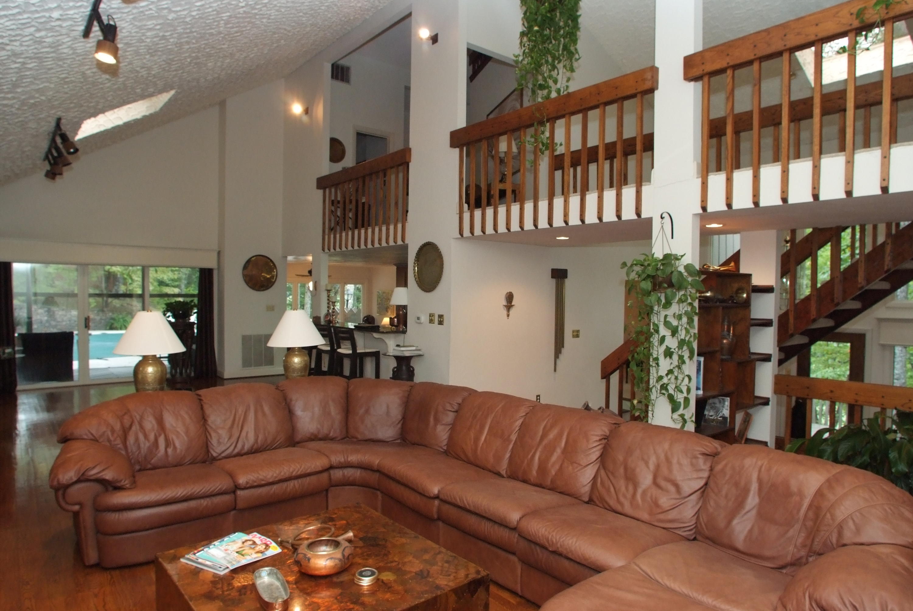 4838 Deerfield Road Southwest Roanoke, VA 24018 - Photo 8 of 26 a view of a living room and a couch in a living room
