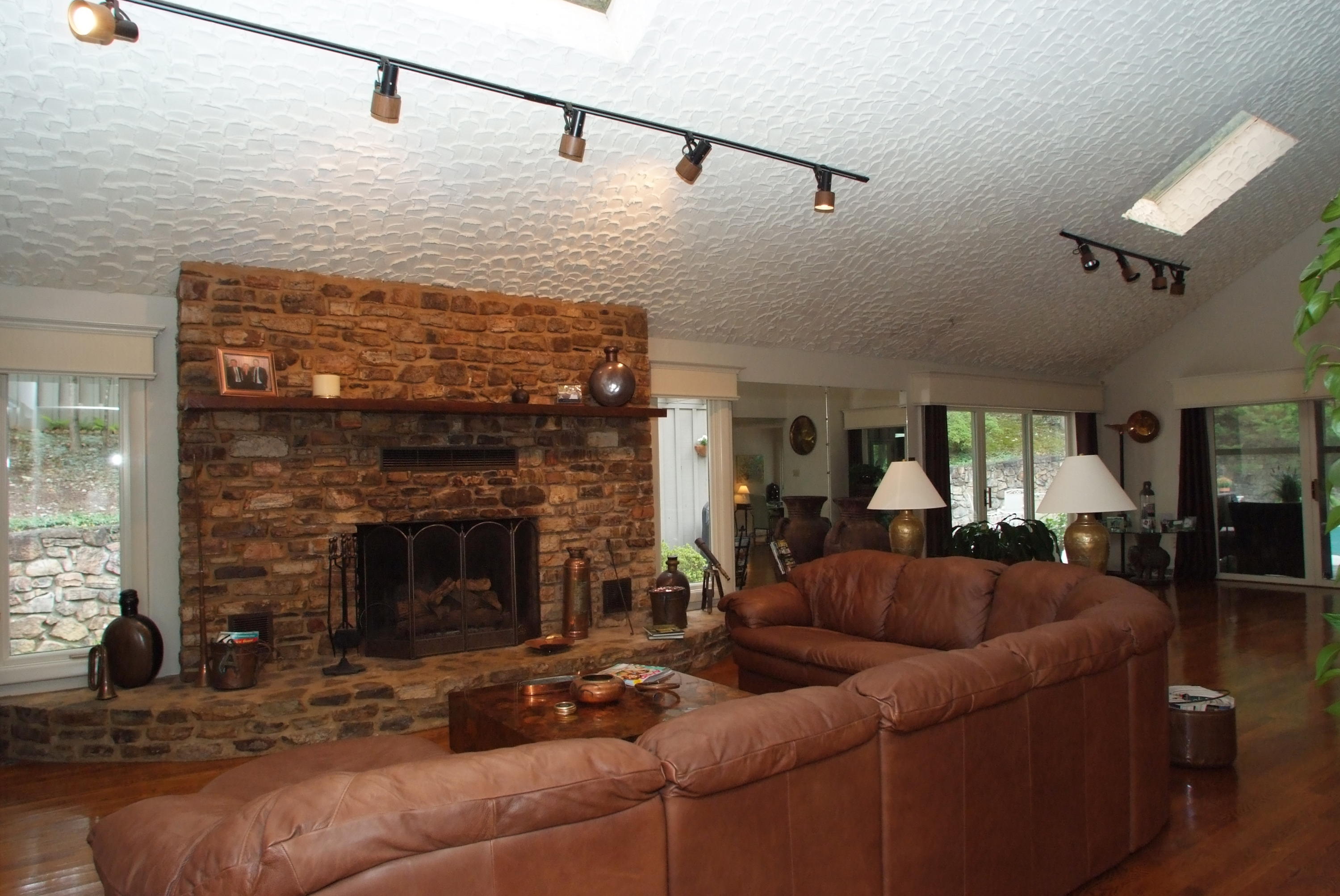 4838 Deerfield Road Southwest Roanoke, VA 24018 - Photo 9 of 26 a living room with furniture and a fireplace
