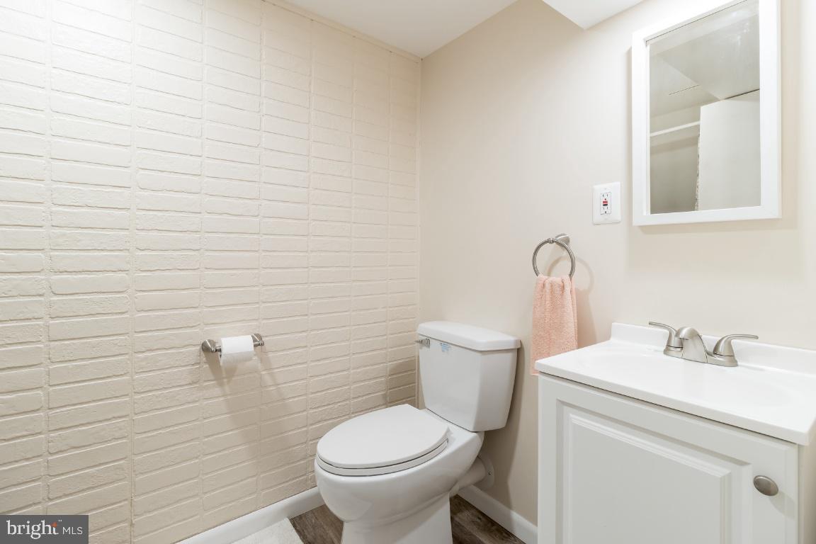 1104 Anglesea Street Baltimore, MD 21224 - Photo 21 of 25 Lower level half bath