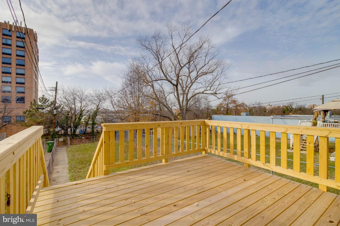 1104 Anglesea Street Baltimore, MD 21224 - Photo 22 of 25 Large deck off back of home is new