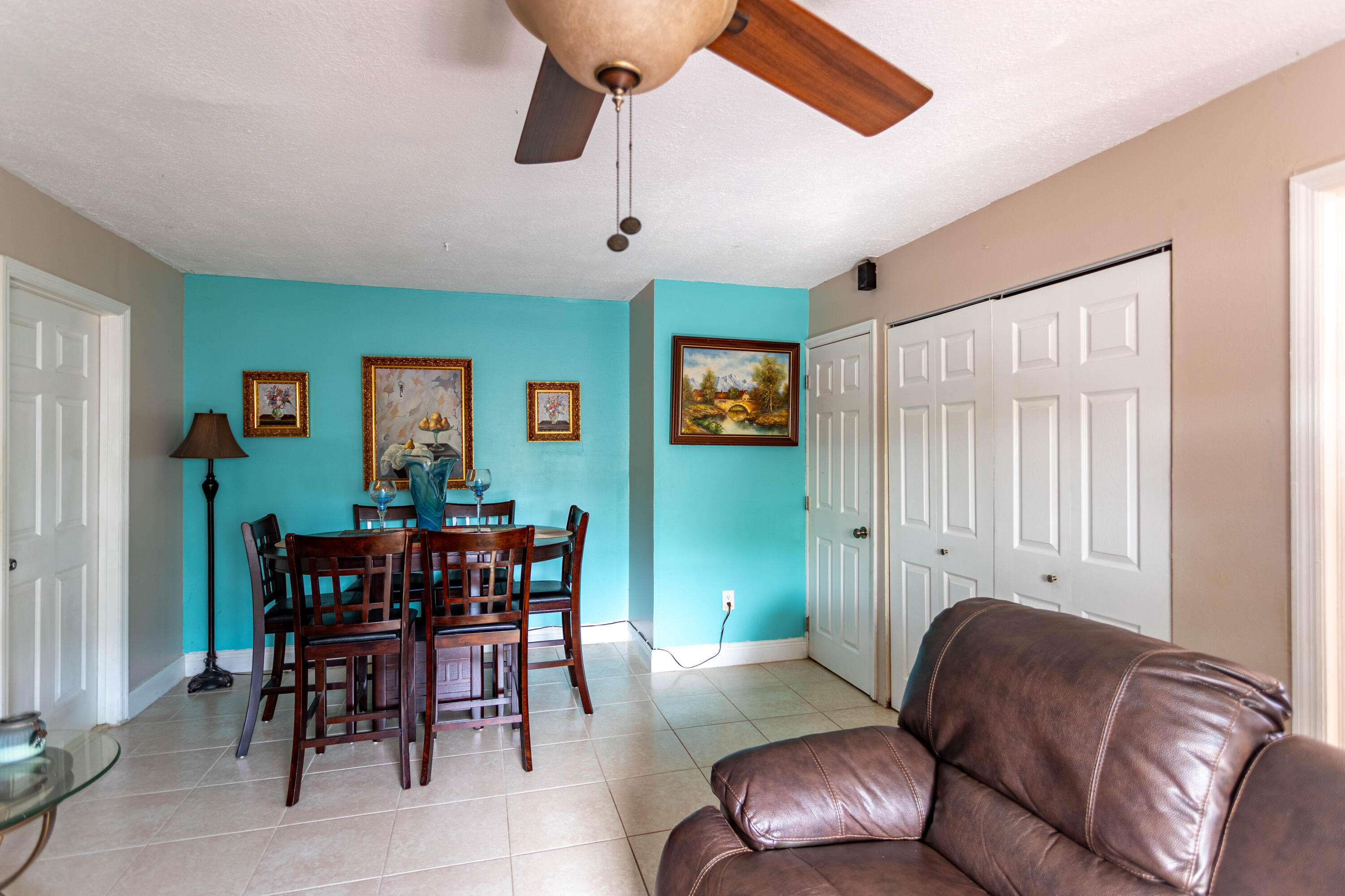 11210 Southwest 157th Street Miami, FL 33157 - Photo 14 of 55 a living room with furniture and a wooden floor