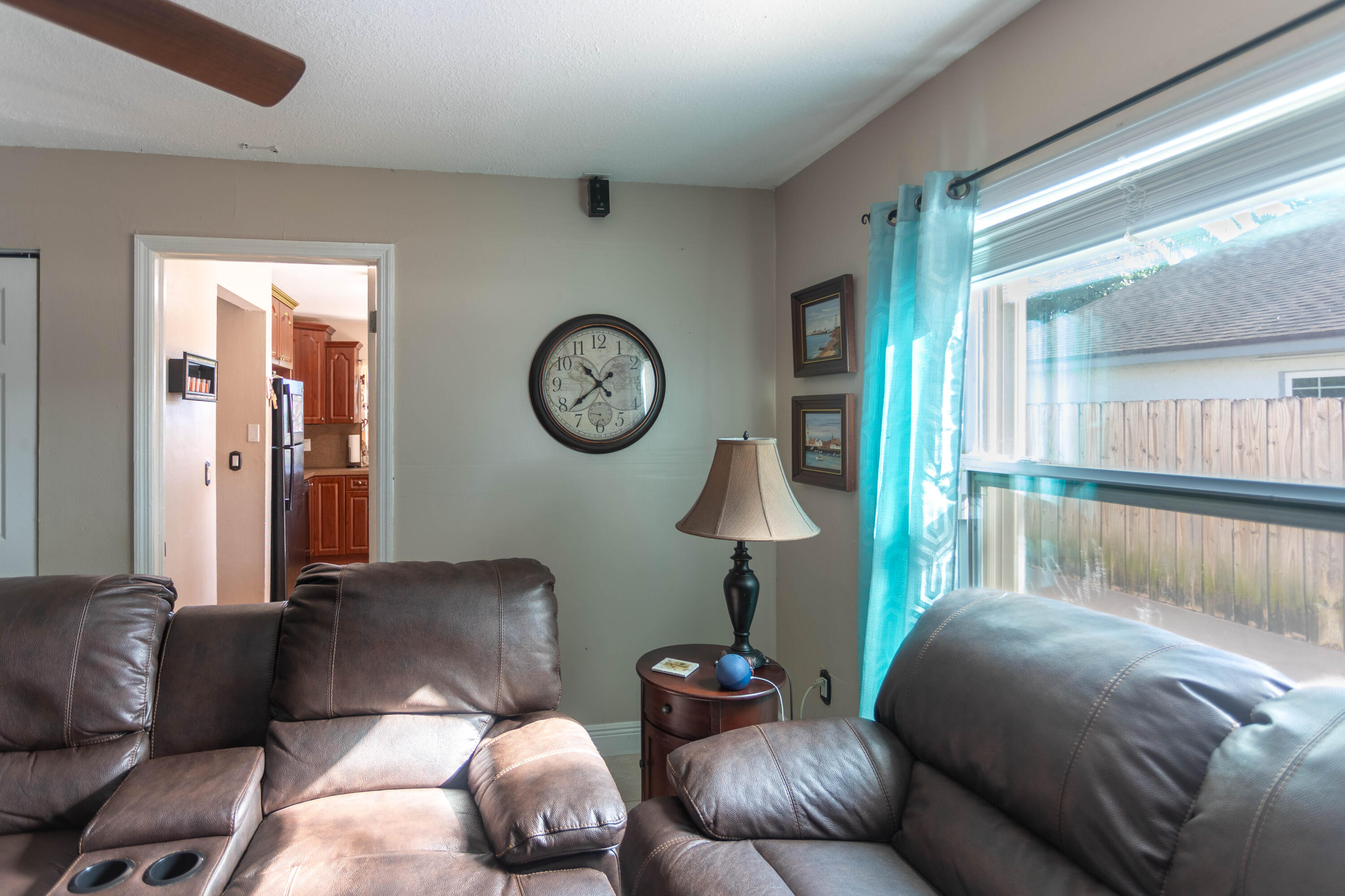 11210 Southwest 157th Street Miami, FL 33157 - Photo 15 of 55 a living room with furniture a mirror and a window