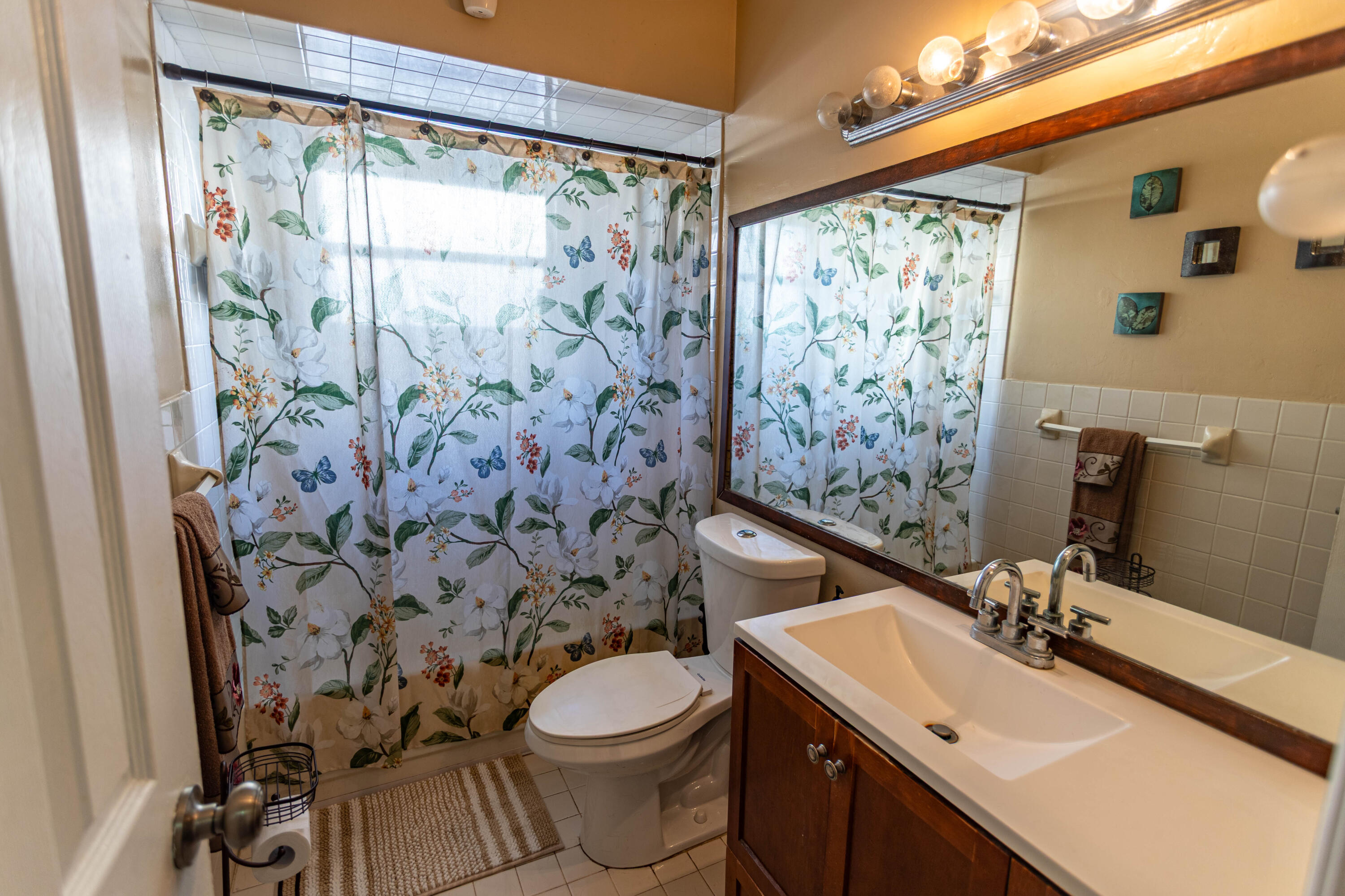 11210 Southwest 157th Street Miami, FL 33157 - Photo 25 of 55 a bathroom with a sink and a mirror