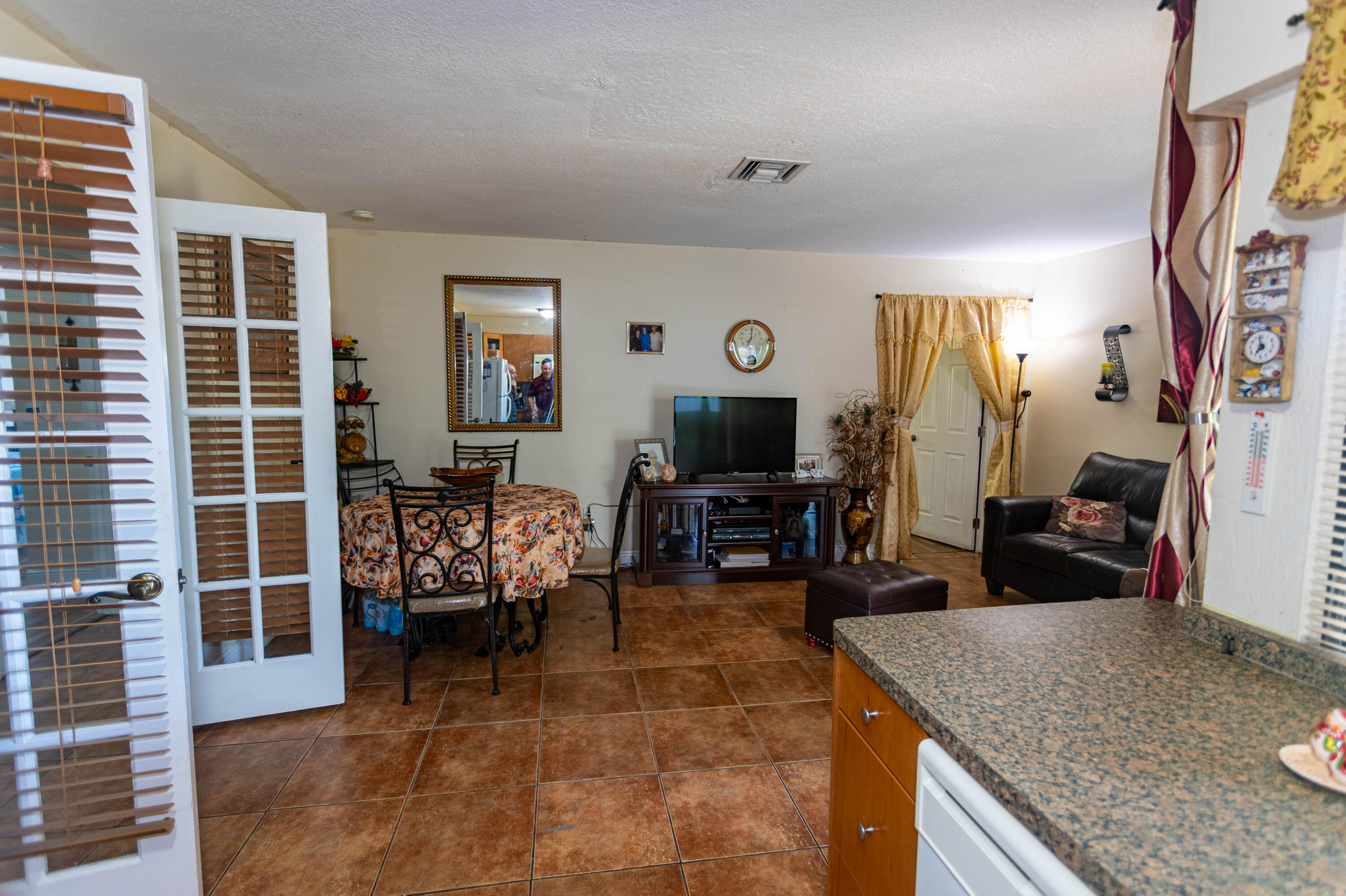 11210 Southwest 157th Street Miami, FL 33157 - Photo 39 of 55 a view of a livingroom with furniture and a window