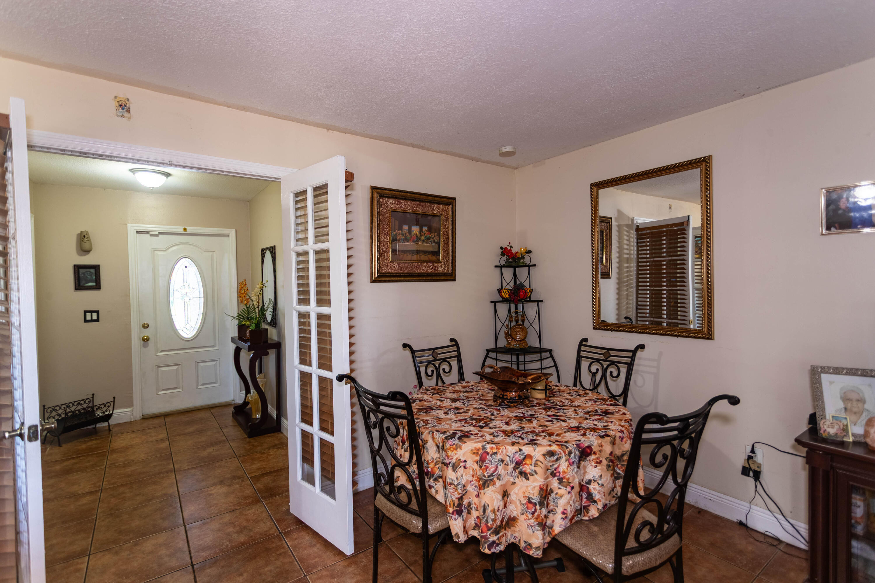 11210 Southwest 157th Street Miami, FL 33157 - Photo 40 of 55 a dining room with furniture and window
