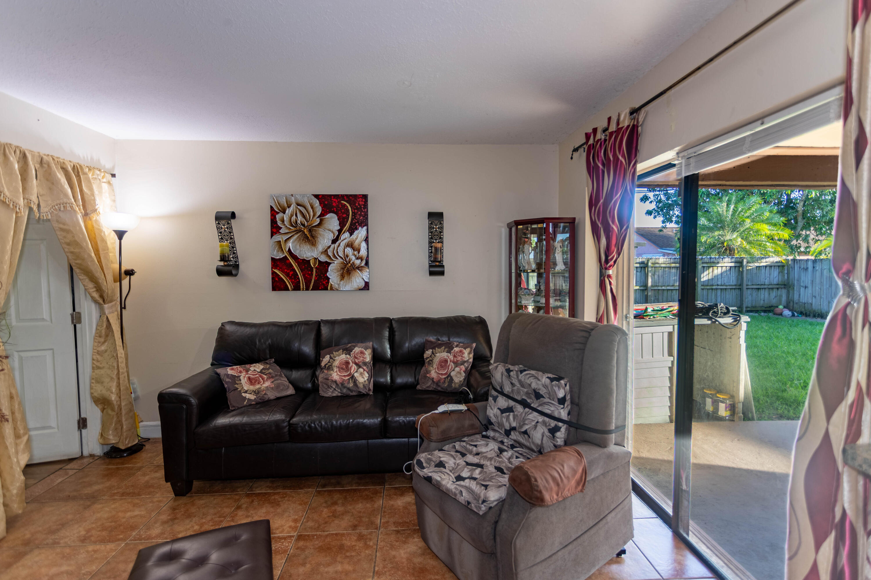 11210 Southwest 157th Street Miami, FL 33157 - Photo 41 of 55 a living room with furniture and a large window