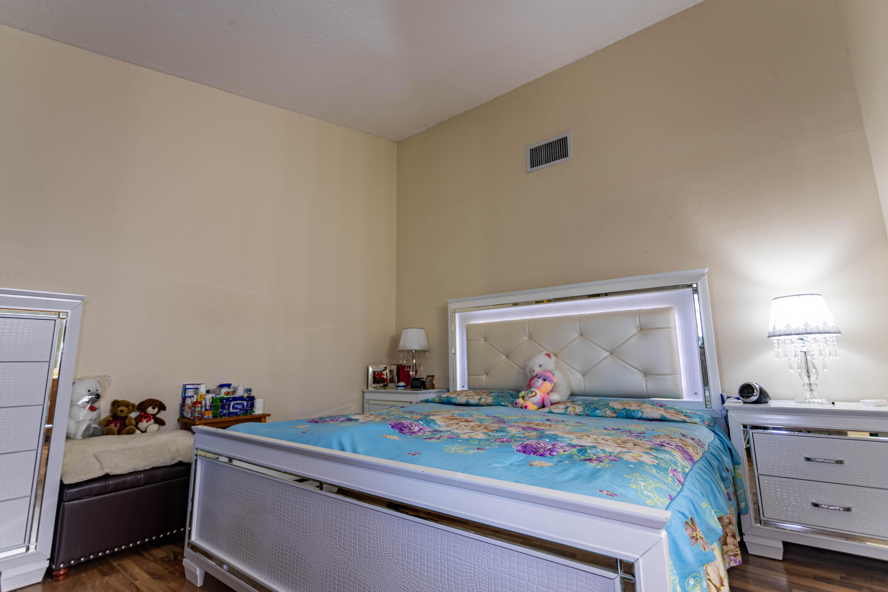 11210 Southwest 157th Street Miami, FL 33157 - Photo 44 of 55 a bedroom with a bed and window