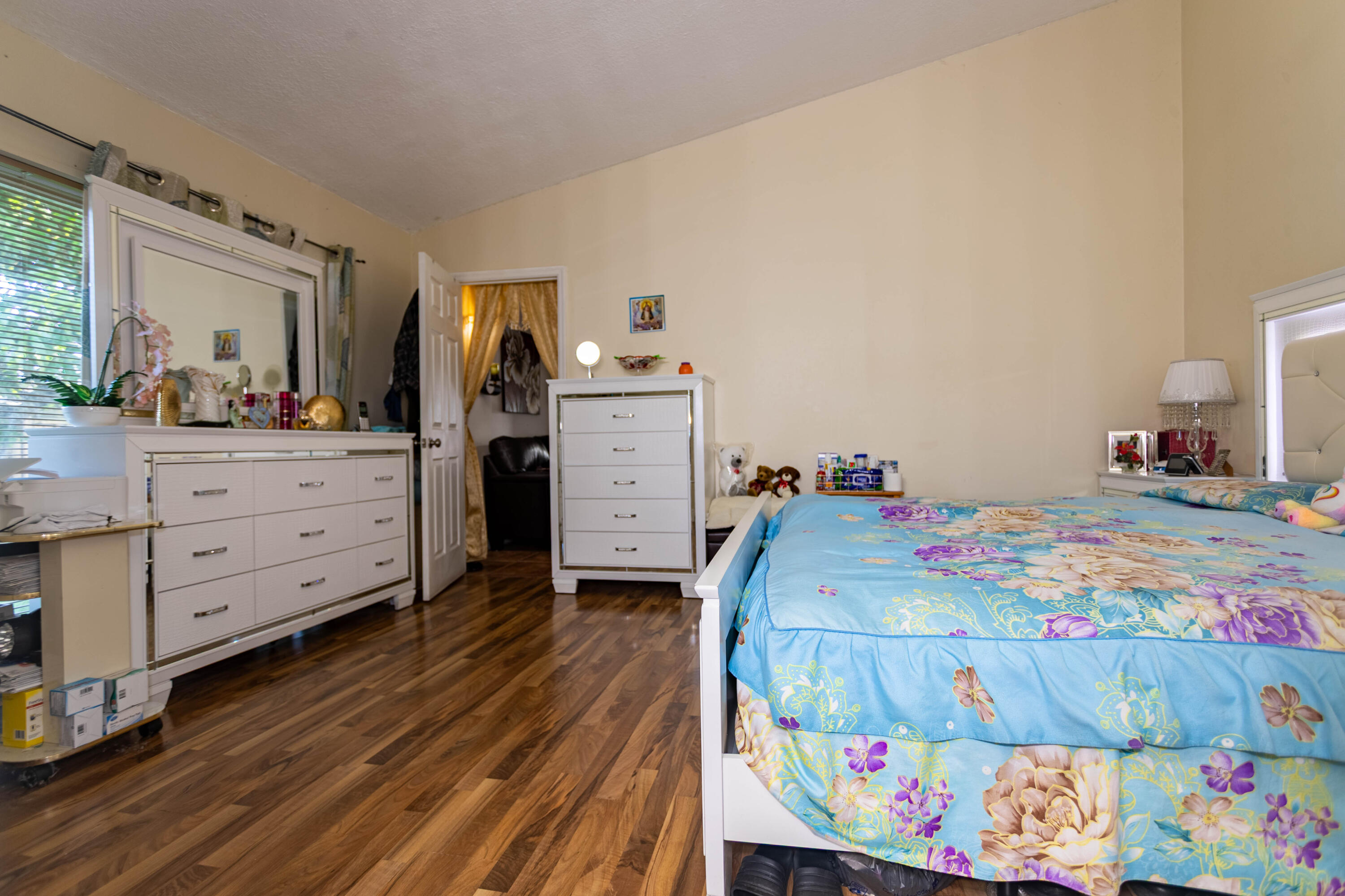 11210 Southwest 157th Street Miami, FL 33157 - Photo 45 of 55 a bed room with a bed and a dresser