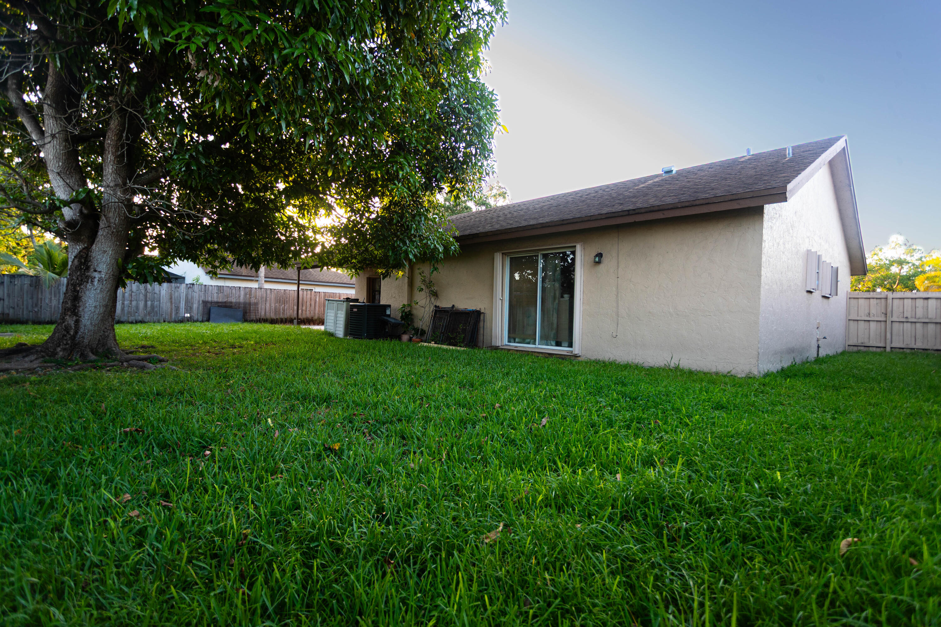 11210 Southwest 157th Street Miami, FL 33157 - Photo 53 of 55 a house view with a garden space
