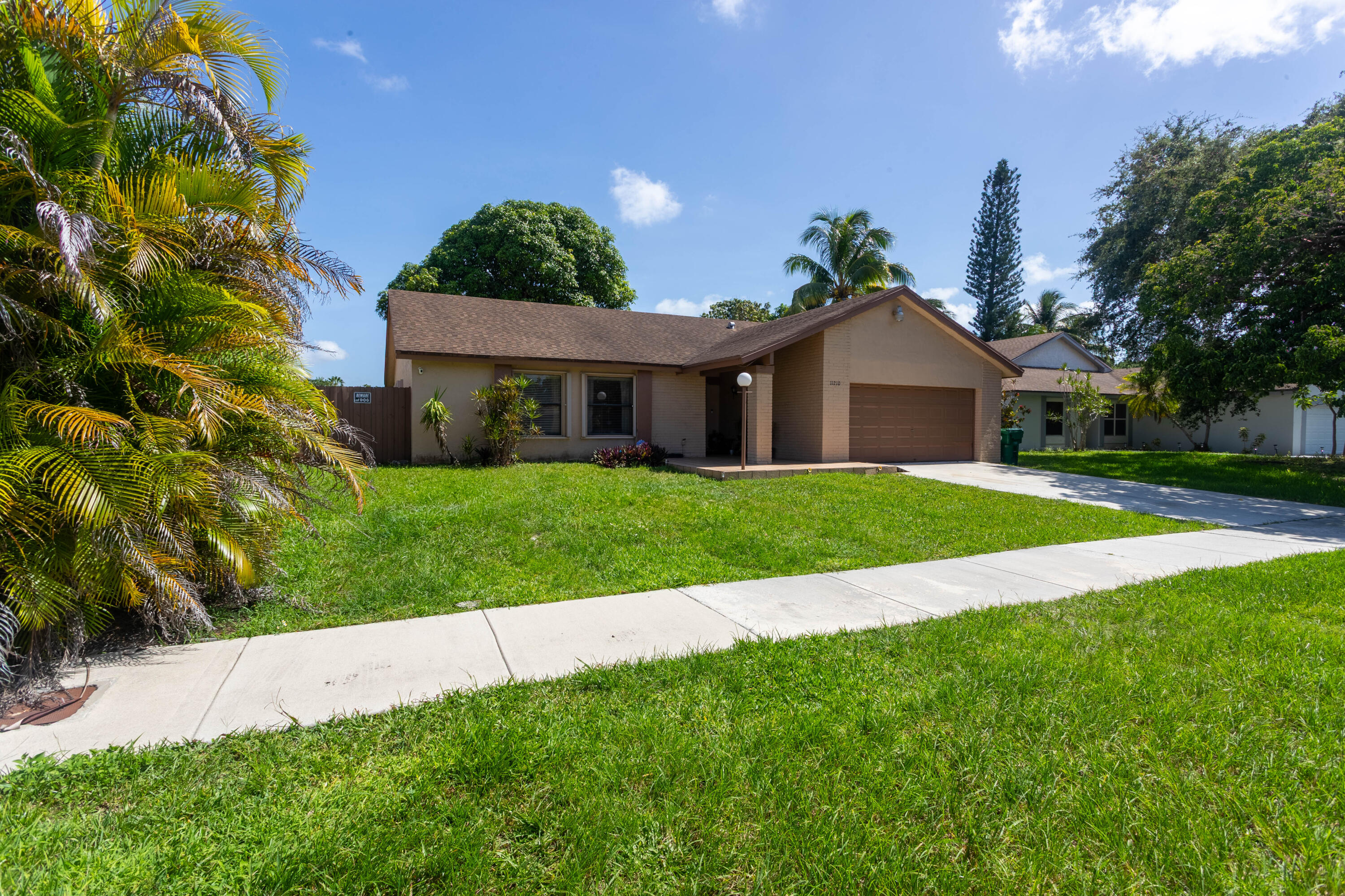 11210 Southwest 157th Street Miami, FL 33157 - Photo 6 of 55 a view of a house with a yard