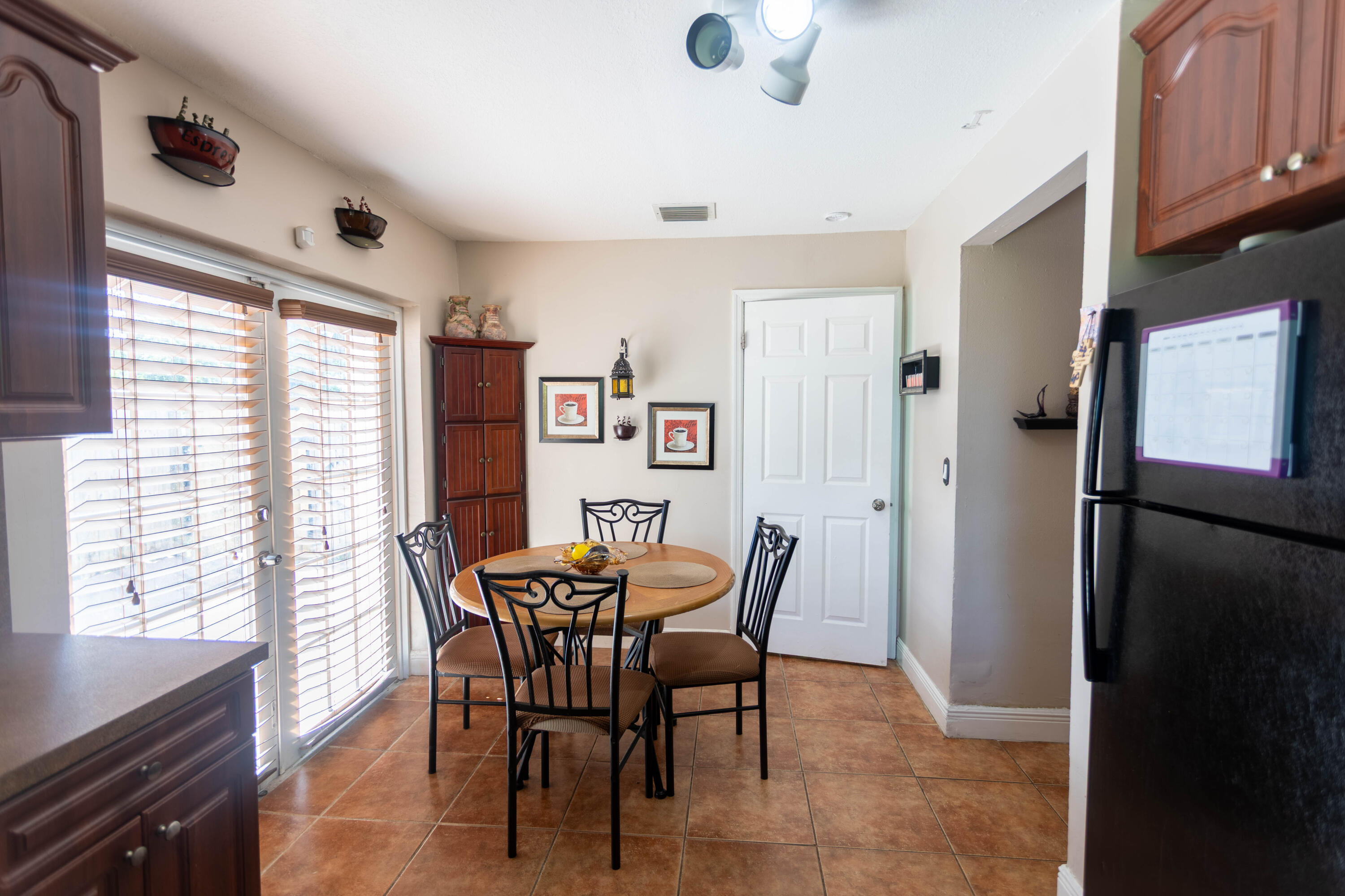 11210 Southwest 157th Street Miami, FL 33157 - Photo 9 of 55 a dining room with furniture and window