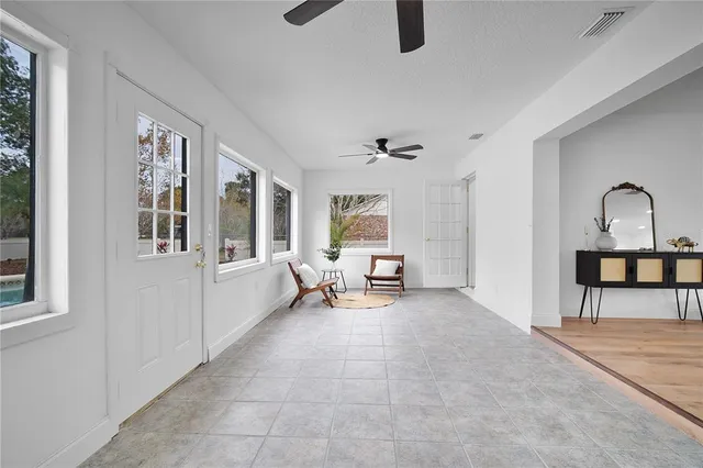 a view of a swimming pool with a yard