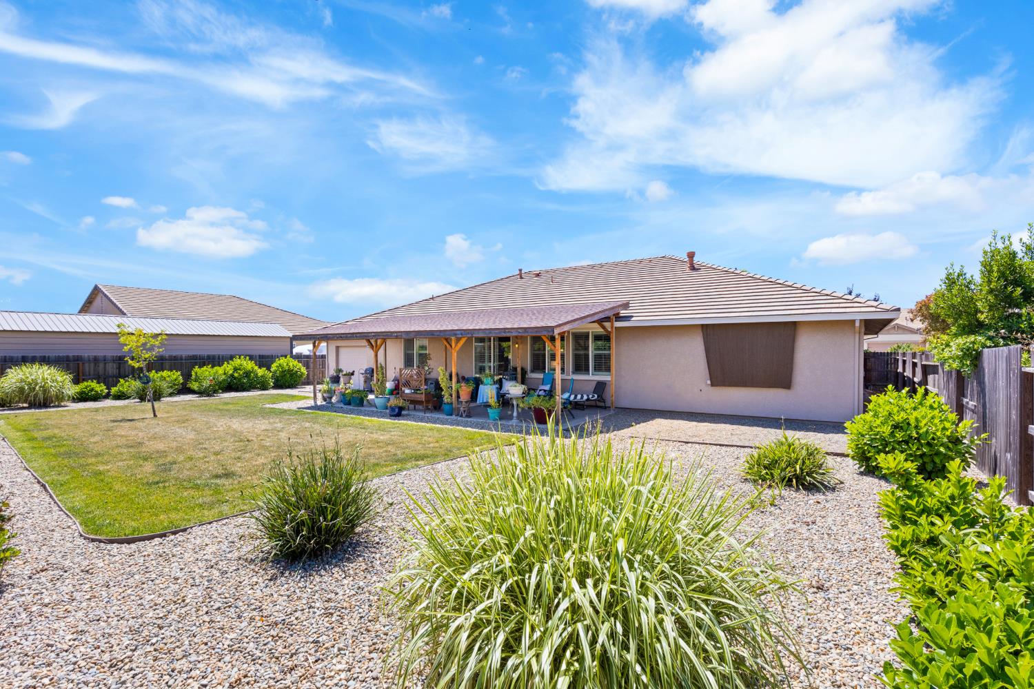 2011 Roy Ranch Way Plumas Lake, CA 95961 - Photo 29 of 49 a view of a house with garden and yard